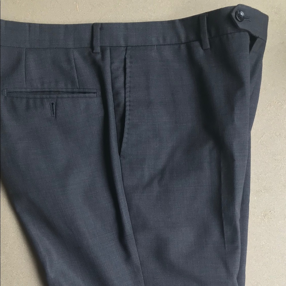 Dress pants, used condition, tear in the seat